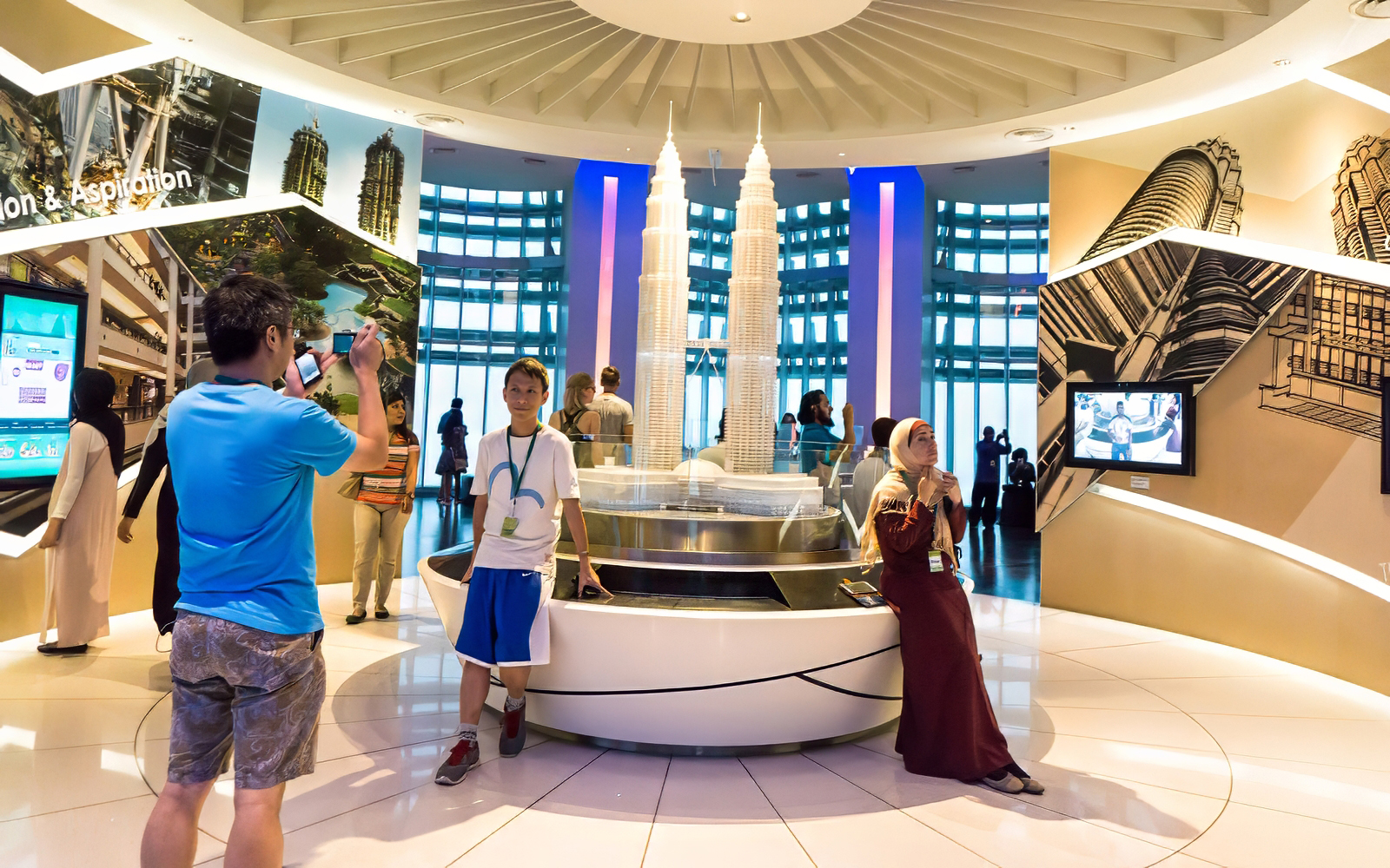 Visitors at Petronas Twin Towers exhibit in Kuala Lumpur, Malaysia.