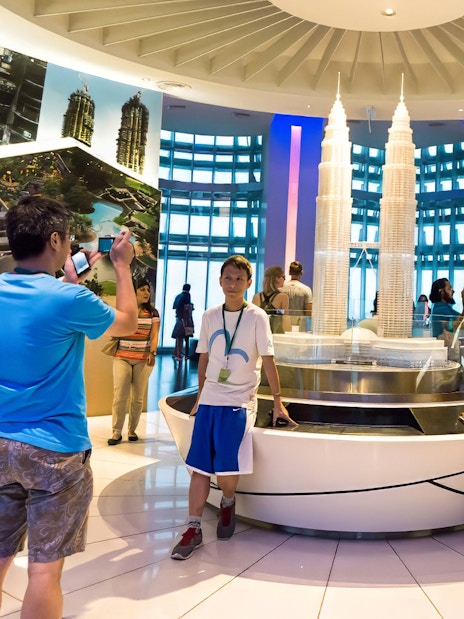 Visitors at Petronas Twin Towers exhibit in Kuala Lumpur, Malaysia.