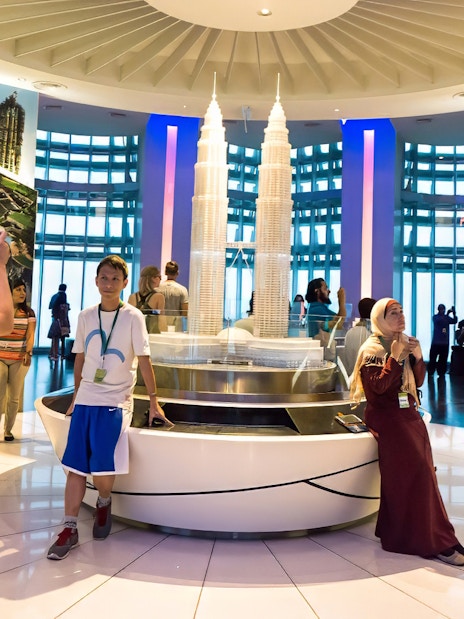 Visitors at Petronas Twin Towers exhibit in Kuala Lumpur, Malaysia.
