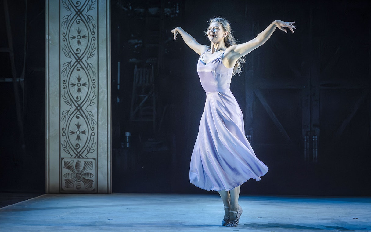 Performer dancing in Grace Pervades West End show.