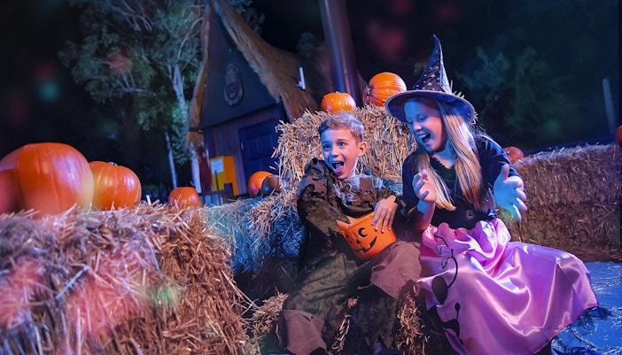 Dreamworld Gold Coast Halloween event with costumed characters and festive decorations.