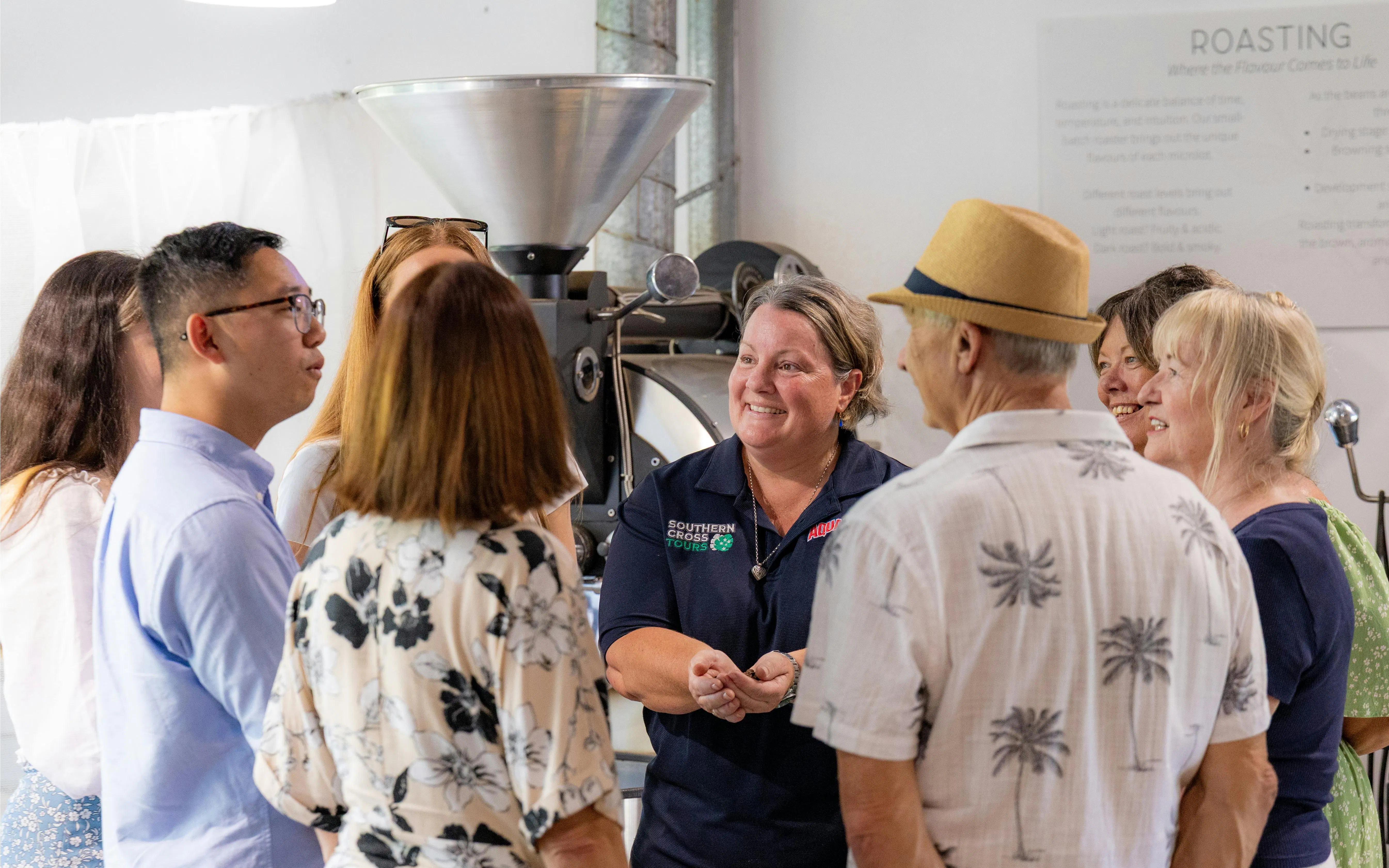 Tour group learning about coffee roasting on Tamborine Mountain.