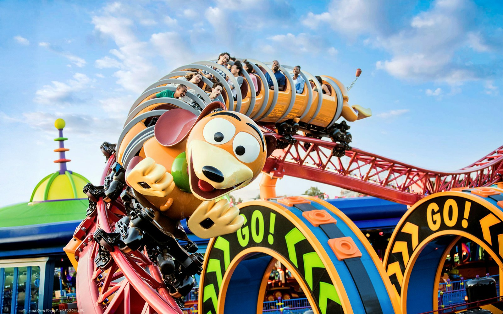 Guests enjoying Slinky Dog Dash rollercoaster at Walt Disney World Resort, Orlando.