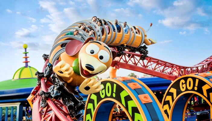 Guests enjoying Slinky Dog Dash rollercoaster at Walt Disney World Resort, Orlando.