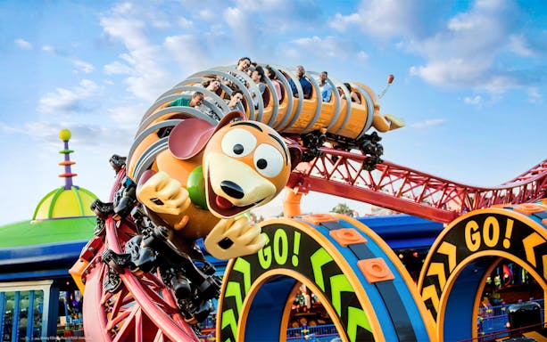 Guests enjoying Slinky Dog Dash rollercoaster at Walt Disney World Resort, Orlando.
