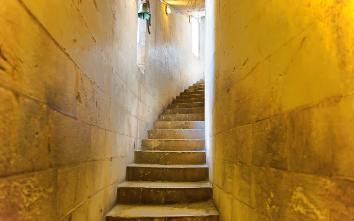 Spiral staircase inside the Leaning Tower of Pisa, Italy.