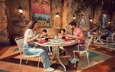 Family dining at an Italian-themed restaurant in Ferrari World Abu Dhabi.