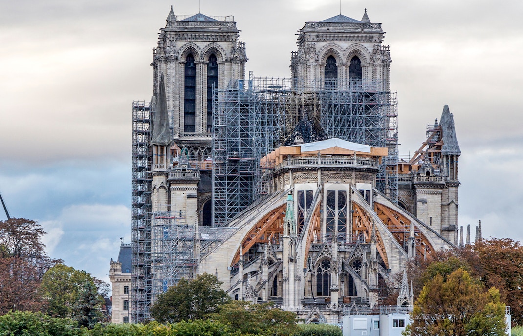 Notre Dame Cathedral facade with scaffolding during restoration in Paris, France.