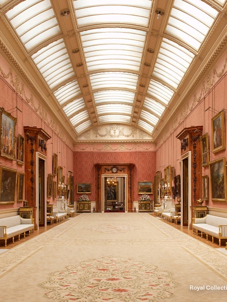 Buckingham Palace Picture Gallery with ornate paintings and elegant decor.