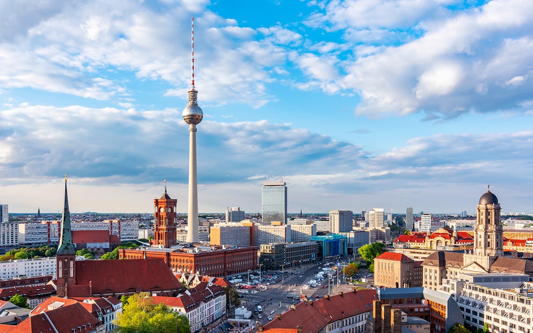 Berlin cityscape featuring the Berlin TV Tower and surrounding architecture.