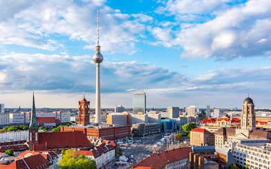 Berlin cityscape featuring the Berlin TV Tower and surrounding architecture.