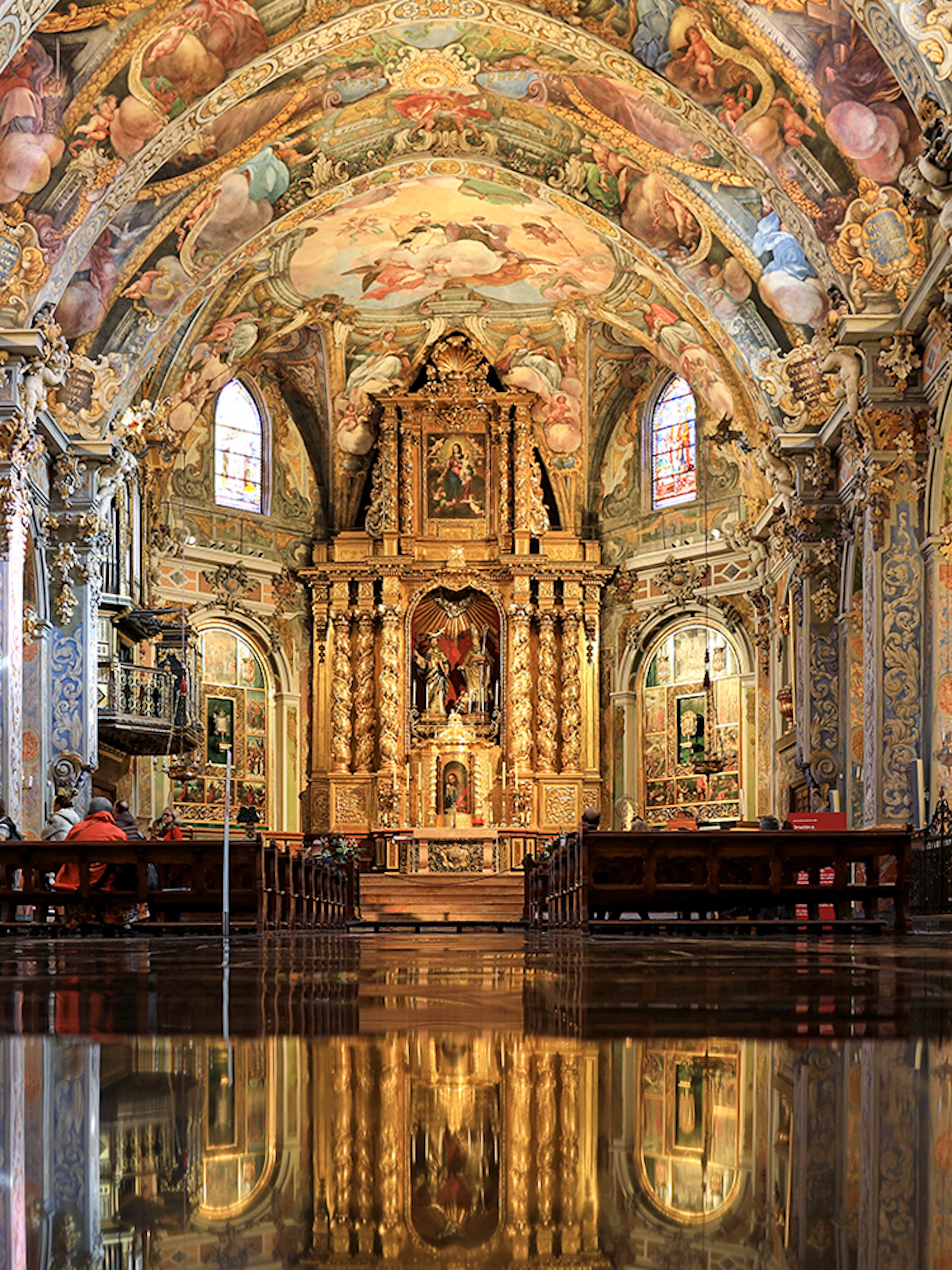 San Nicolas Church interior with ornate frescoes and gilded altar, Valencia, Spain.