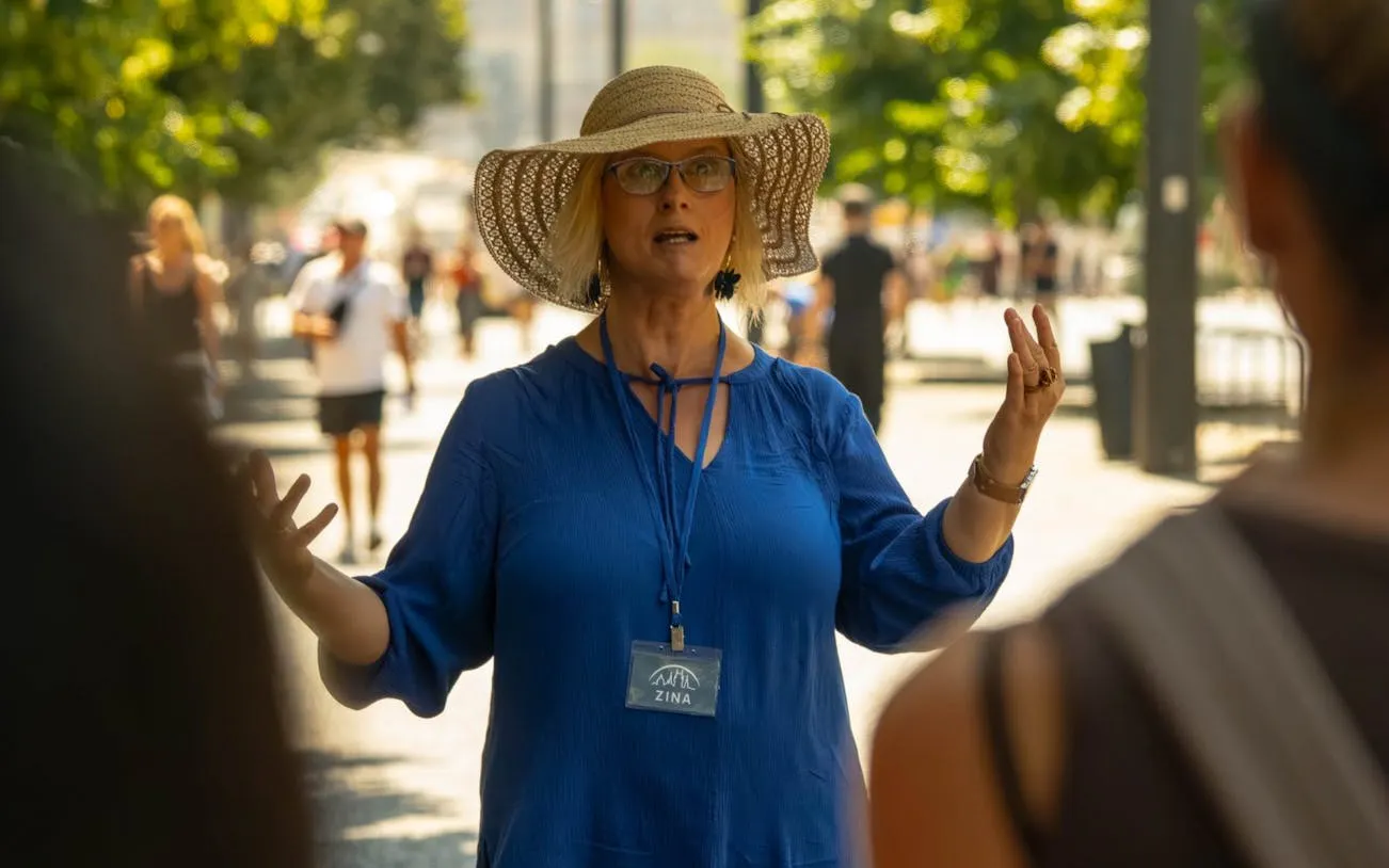 Local guide leading a small-group walking tour in Prague.
