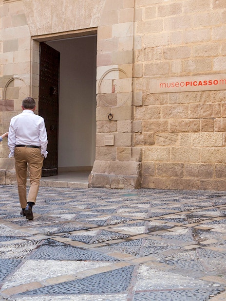 Visitors entering the Picasso Museum in Malaga, Spain.