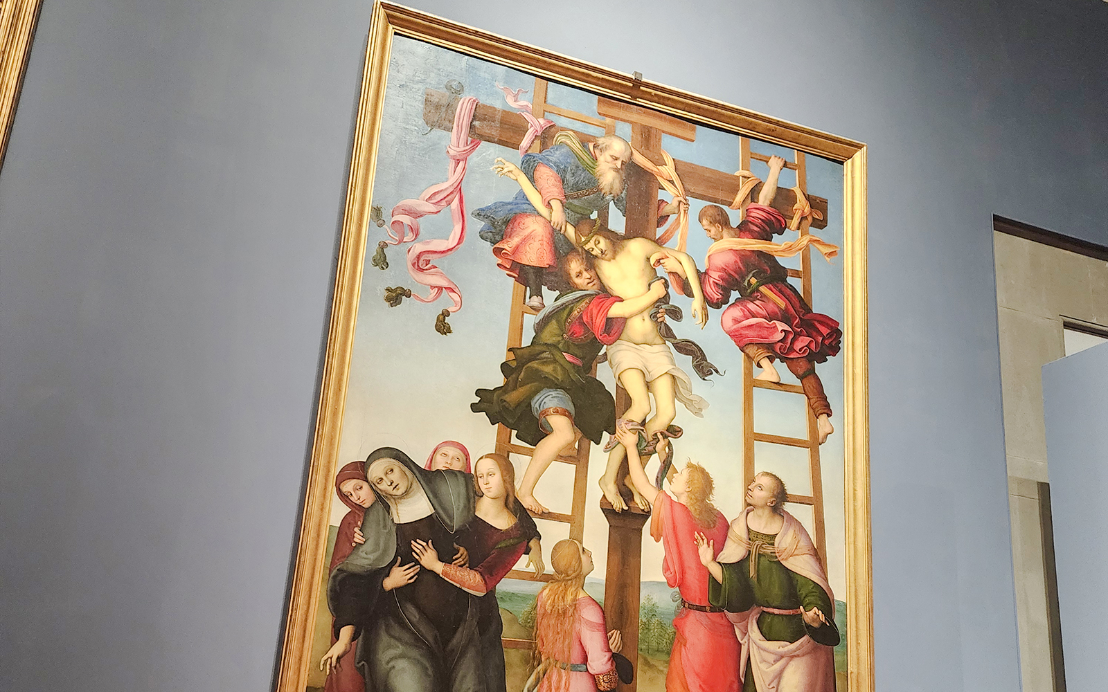 Deposition by Filippino Lippi in Accademia Gallery, Florence, depicting Christ's descent from the cross.