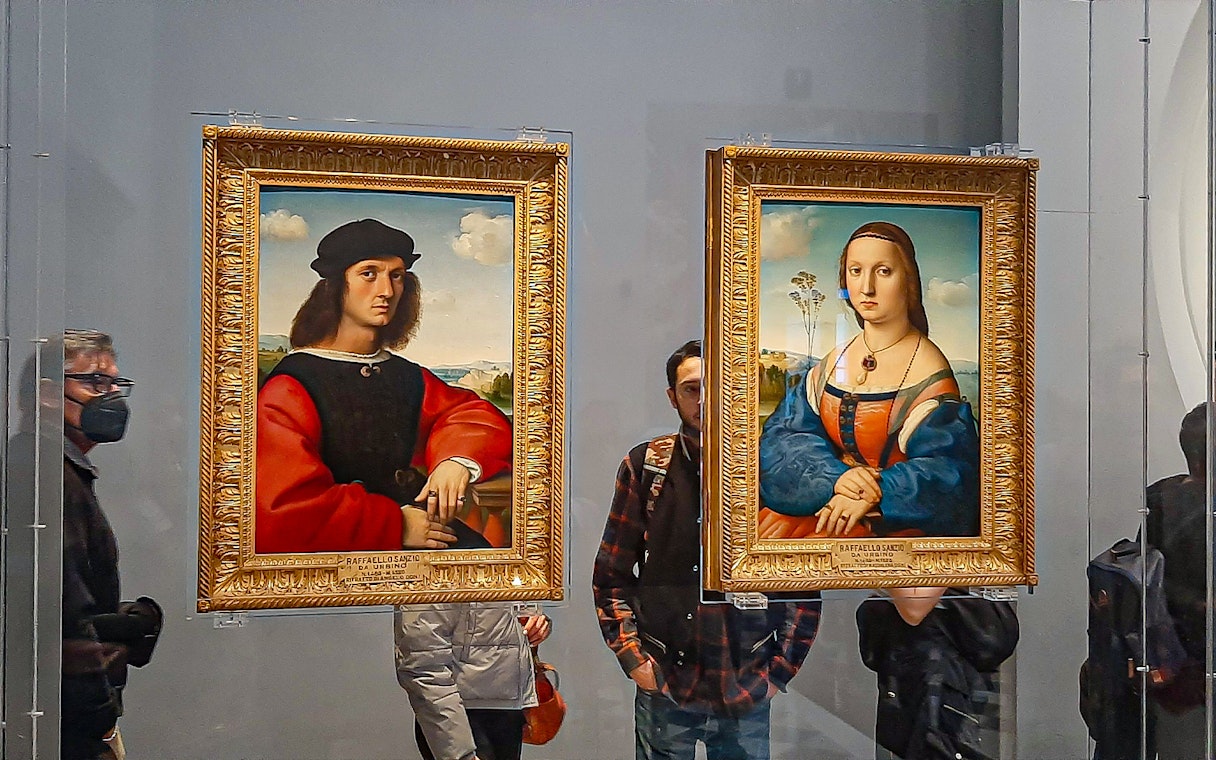 Paintings in Accademia and Uffizi Gallery, Florence, with visitors viewing art.