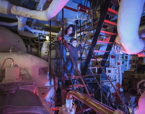 Woman and her child exploring HMS Belfast