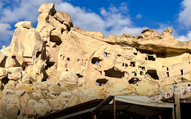 Ruins carved into rock formations in Çavuşin Village, Cappadocia.