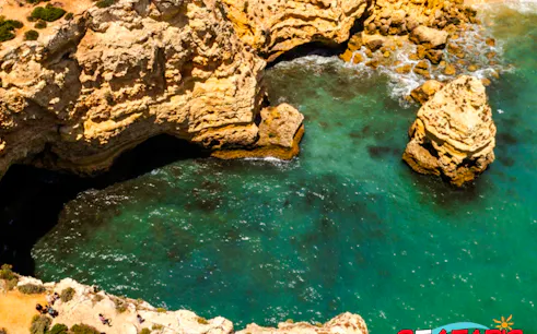 Benagil Cave and sea cliffs with turquoise water, Lagos boat tour.