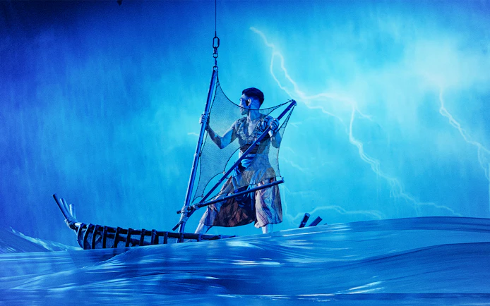 Performer on a boat in Varuna Underwater Theatrical Dining Experience.