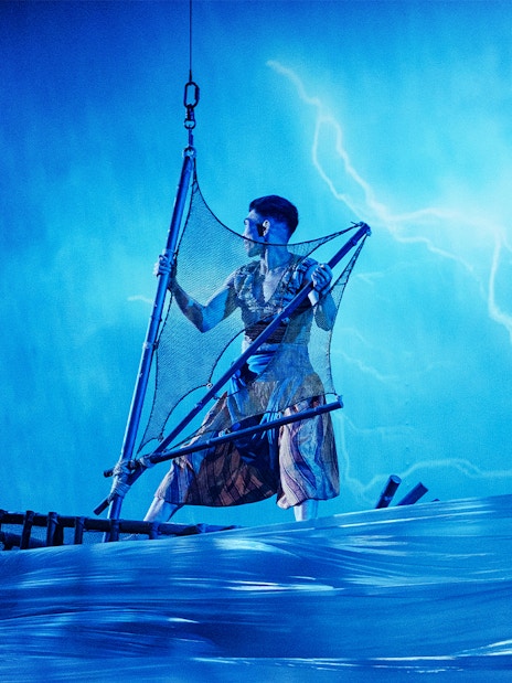 Performer on a boat in Varuna Underwater Theatrical Dining Experience.