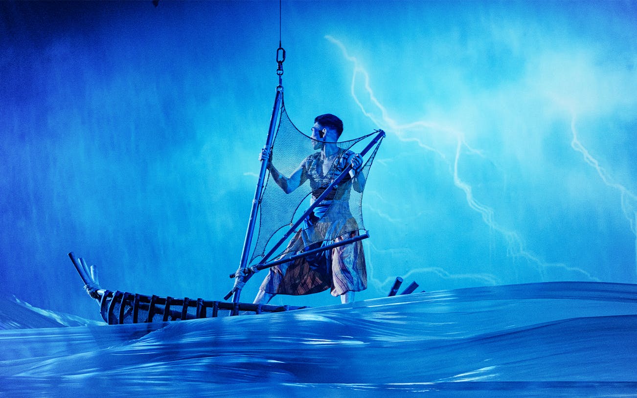 Performer on a boat in Varuna Underwater Theatrical Dining Experience.