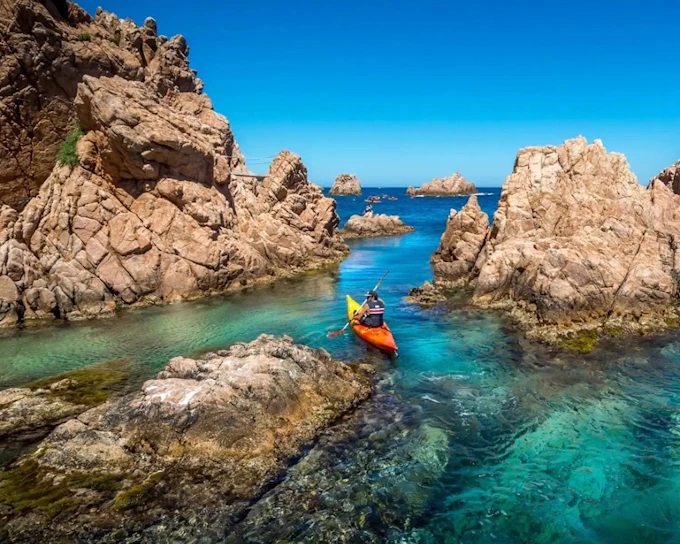 From Barcelona: Costa Brava Day Trip with Kayak, Snorkel, Cliff Jump & Lunch