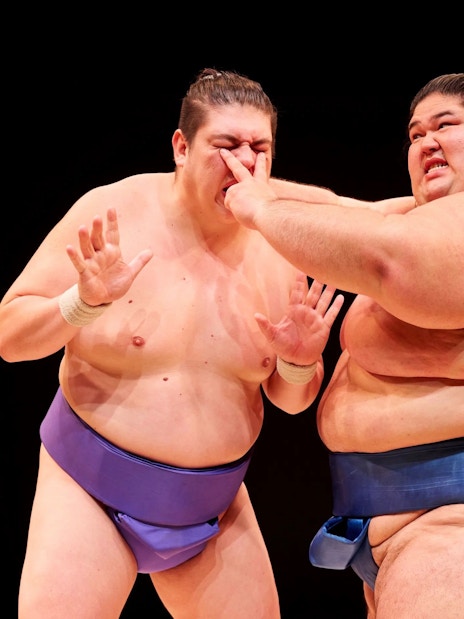 Sumo wrestlers in action at Hirakuza Ginza Tokyo Sumo Show.