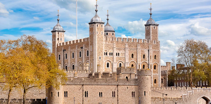 Tower of London with historic stone walls and turrets, United Kingdom.