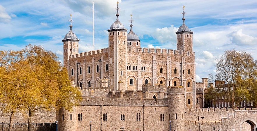 Tower of London with historic stone walls and turrets, United Kingdom.