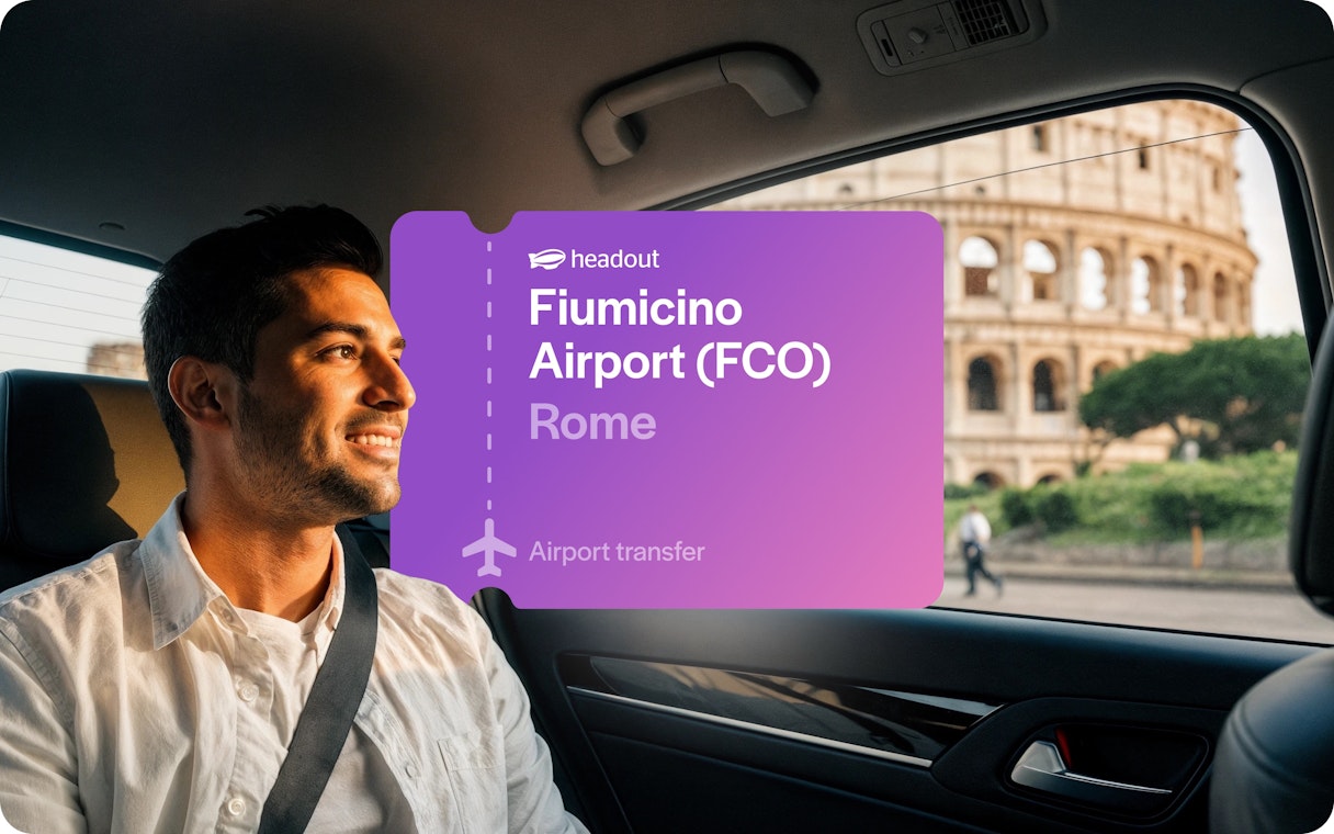 Tourist in cab near Colosseum, Rome with Fiumicino Airport transfer sign.
