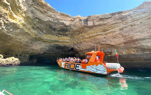 Boat entering Benagil Cave during guided tour from Albufeira.