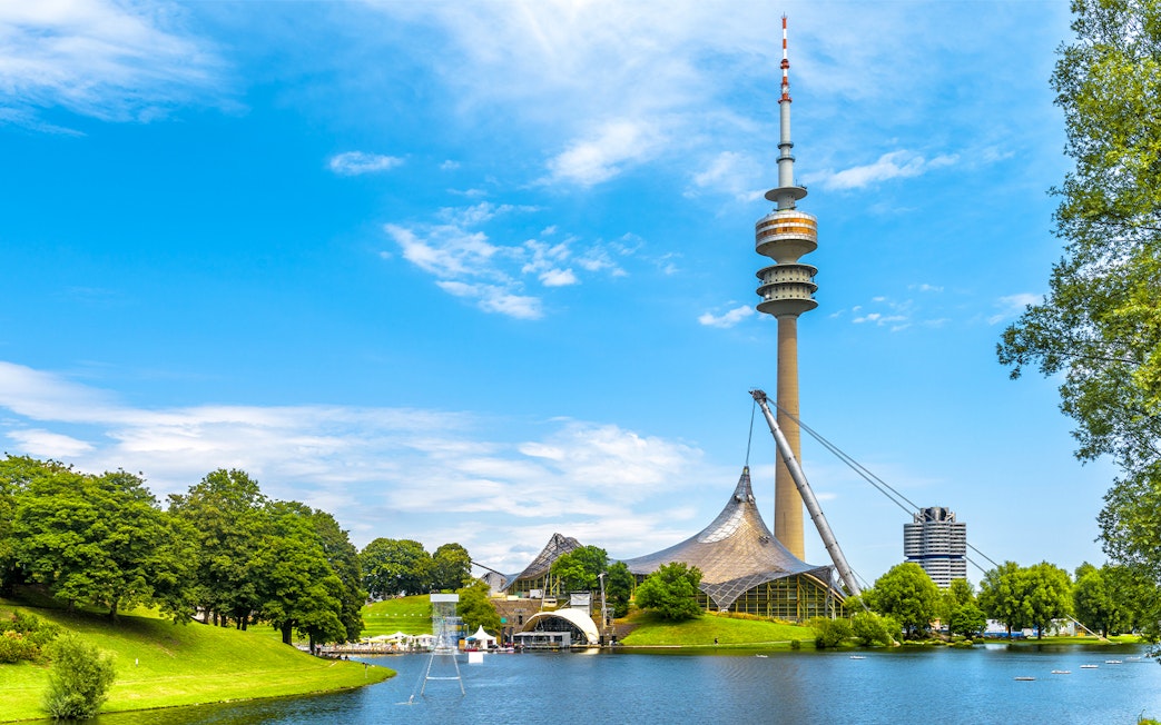 Olympic Tower and park view on Munich Hop-On Hop-Off Bus Tour.