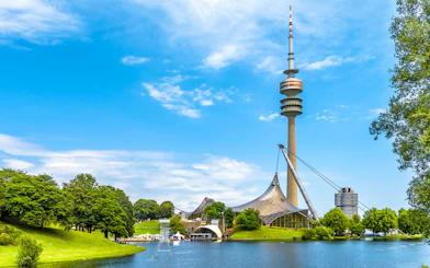 Olympic Tower and park view on Munich Hop-On Hop-Off Bus Tour.