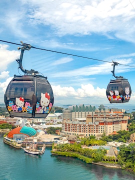 Cable cars with Hello Kitty design over Sentosa Island, Singapore.