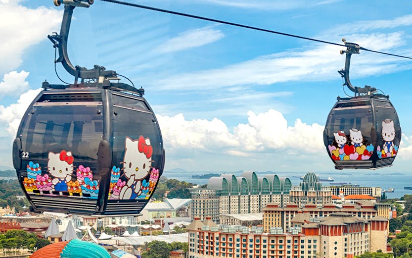 Cable cars with Hello Kitty design over Sentosa Island, Singapore.