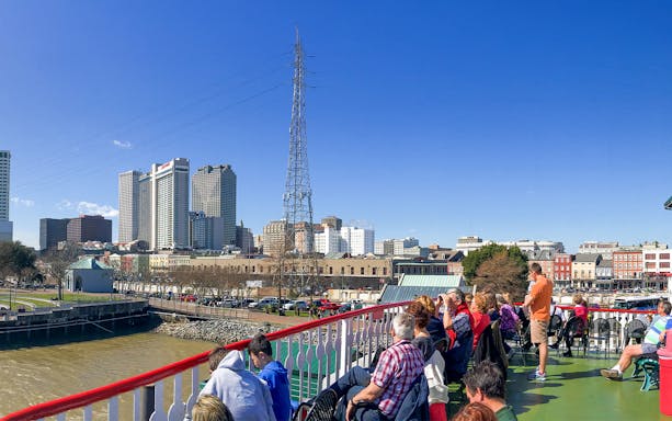 New Orleans city skyline from Steamboat Natchez on Mississippi River.