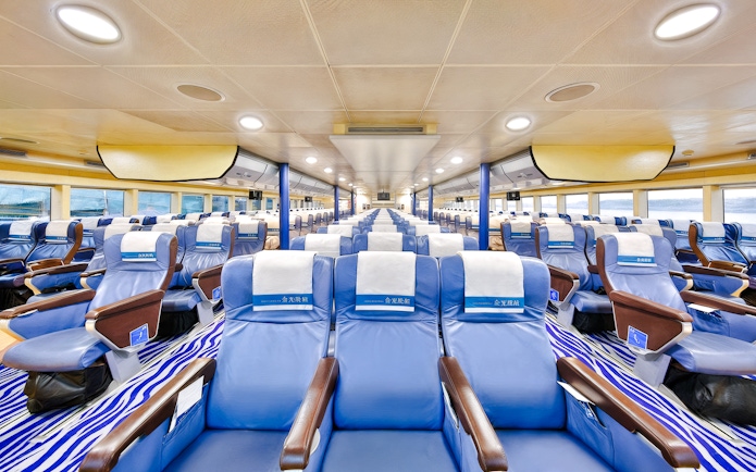 Interior seating of Cotai Water Jet Ferry between Hong Kong Island and Macau.