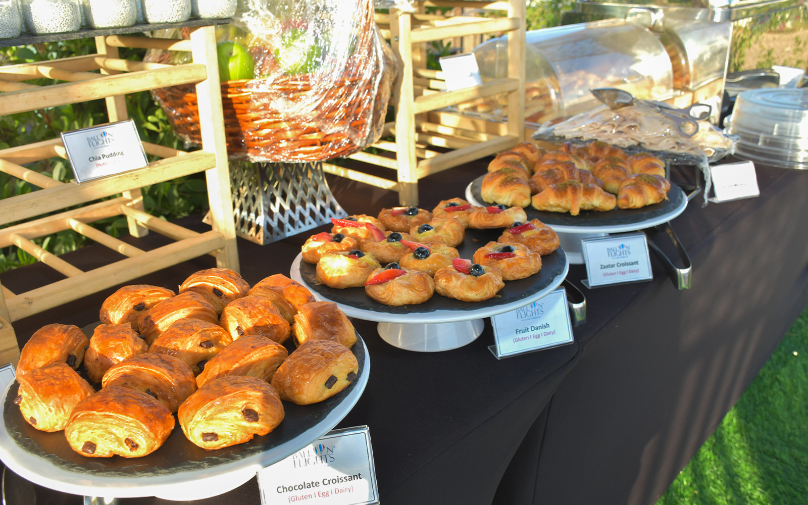 Assorted pastries on display for hot air balloon experience breakfast.
