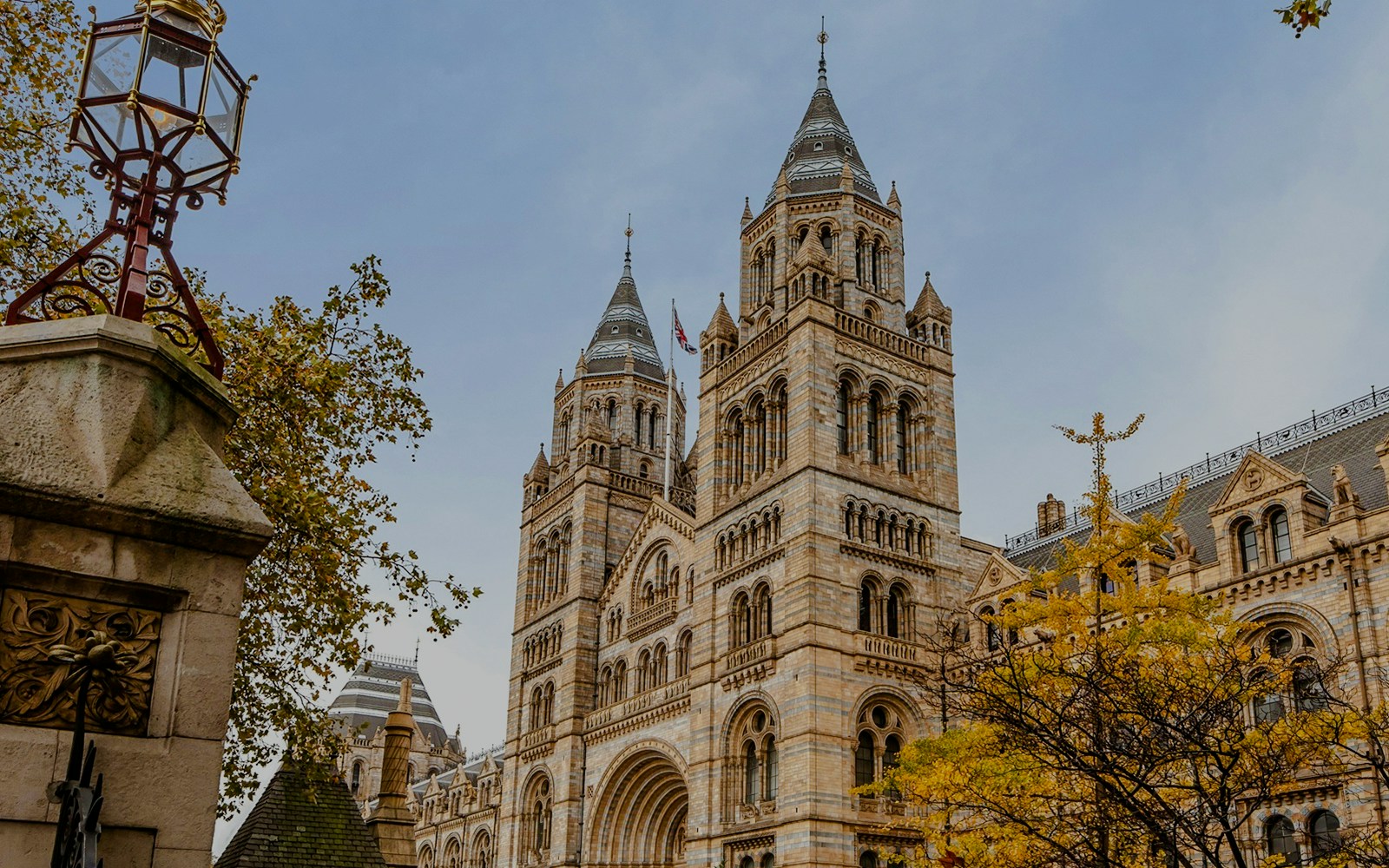 Natural History Museum London facade with intricate architecture and grand entrance.
