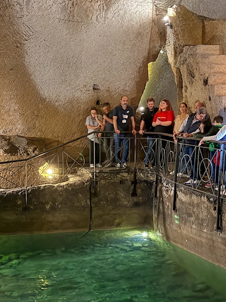 Visitors exploring Bourbon Gallery in Naples underground.