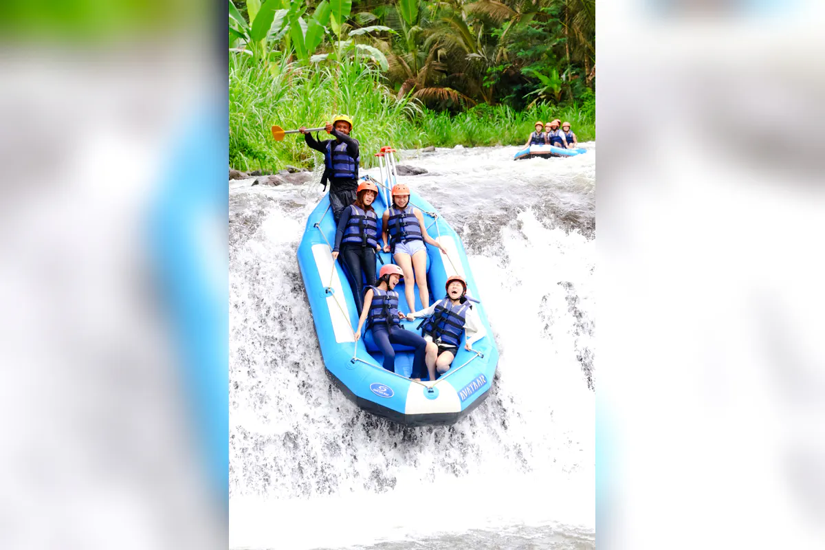 Rafting group navigating rapids on Telaga Waja River, East Bali.