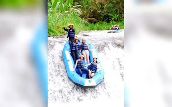 Rafting group navigating rapids on Telaga Waja River, East Bali.