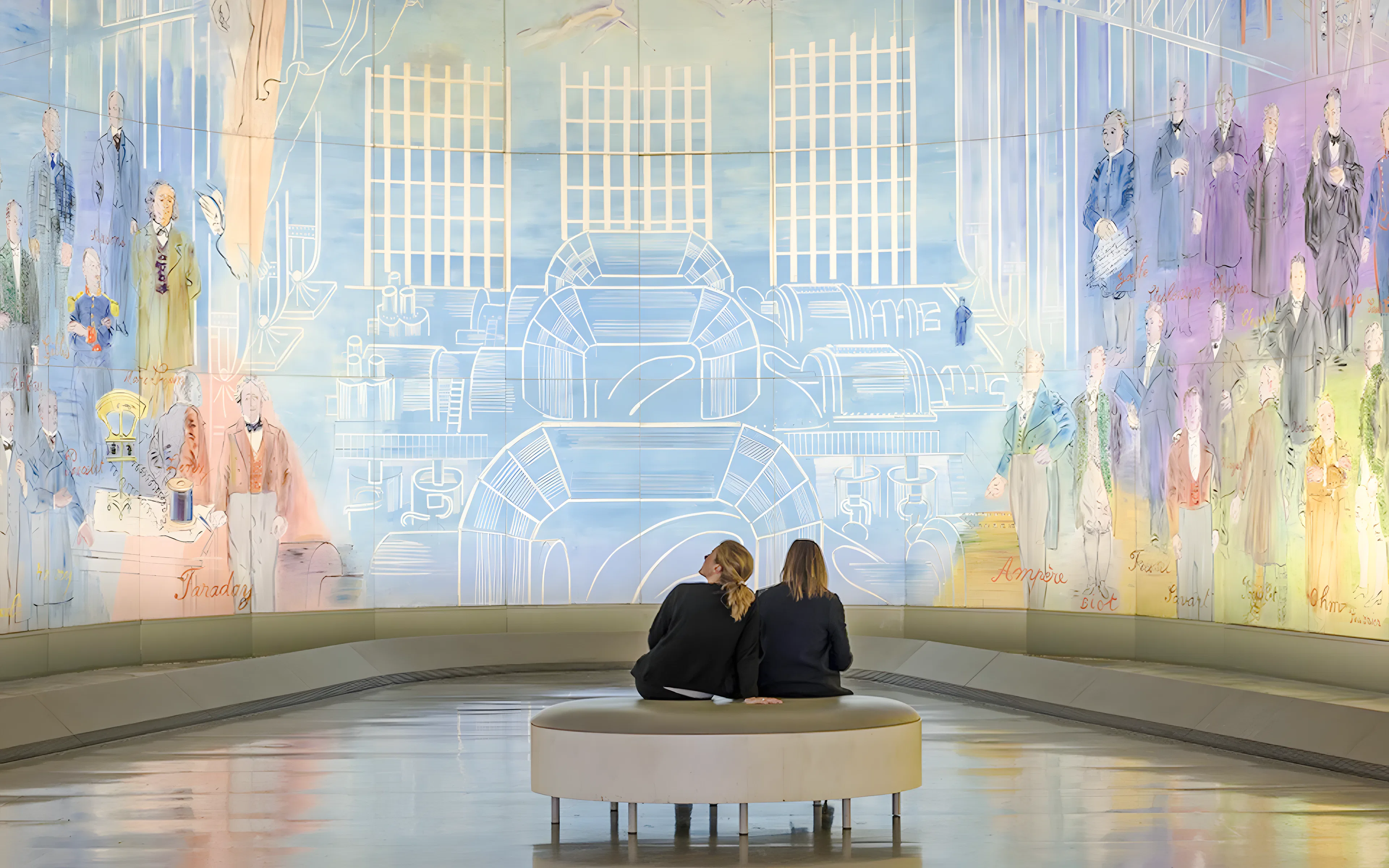 Visitors viewing colorful mural at Museum of Modern Art, Paris, France.