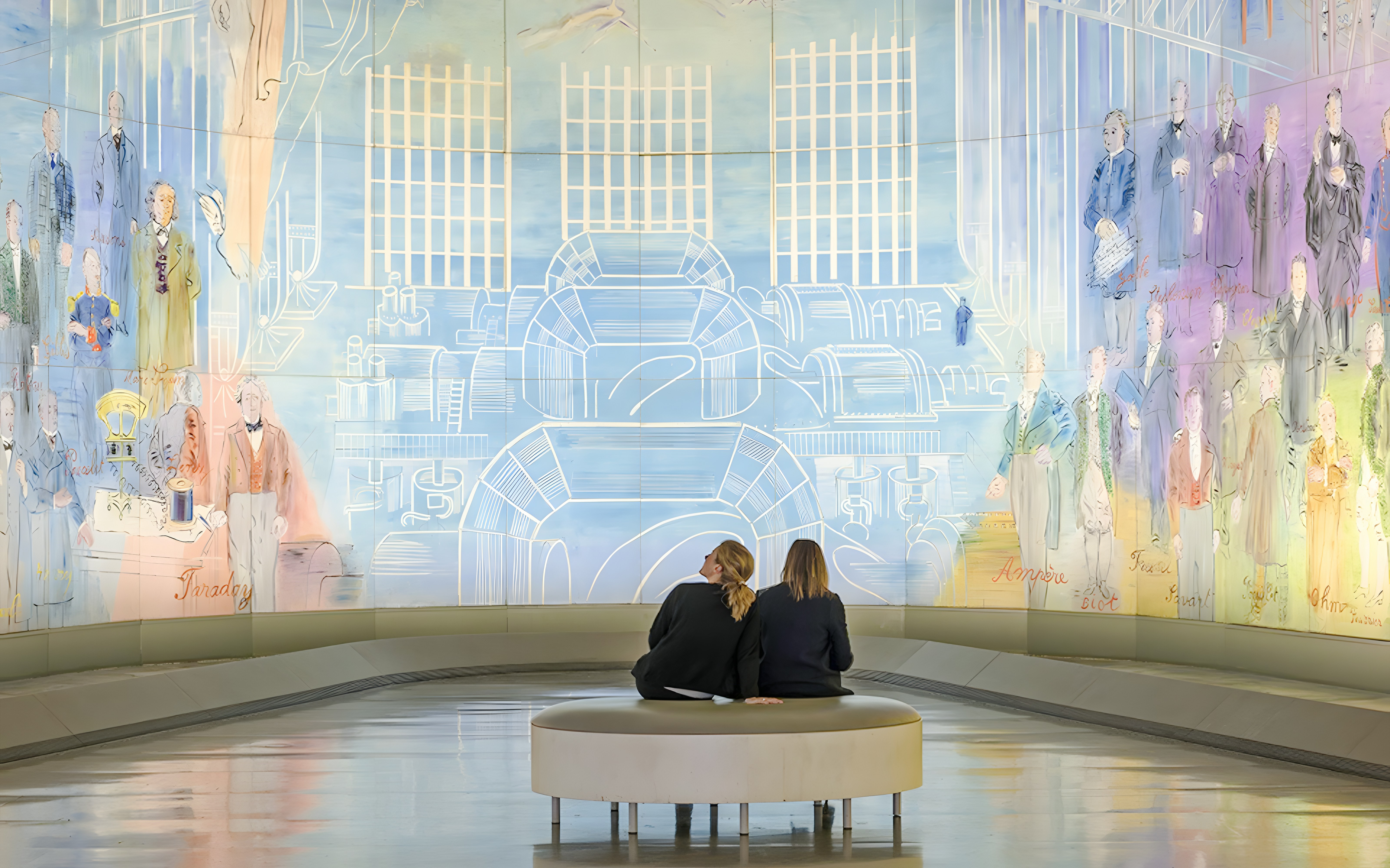 Visitors viewing colorful mural at Museum of Modern Art, Paris, France.