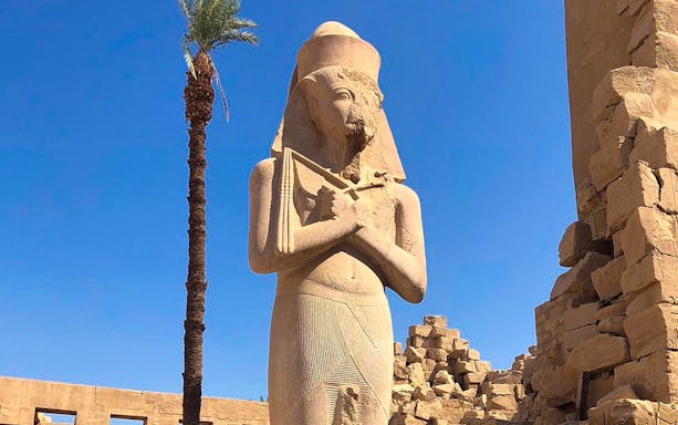 Ancient statue at Karnak Temple, Luxor, seen on Valley of the Kings tour from Hurghada.