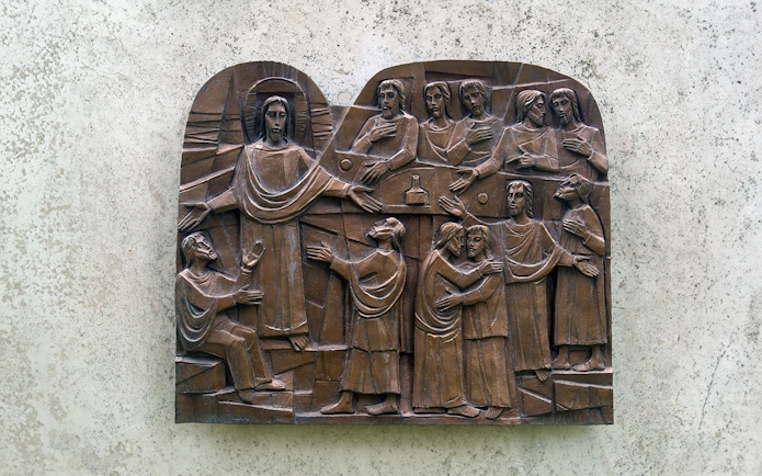 Relief sculpture depicting biblical scene in Catacombs of St. Callixtus, Rome.