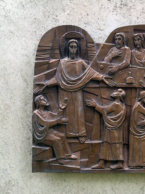 Relief sculpture depicting biblical scene in Catacombs of St. Callixtus, Rome.