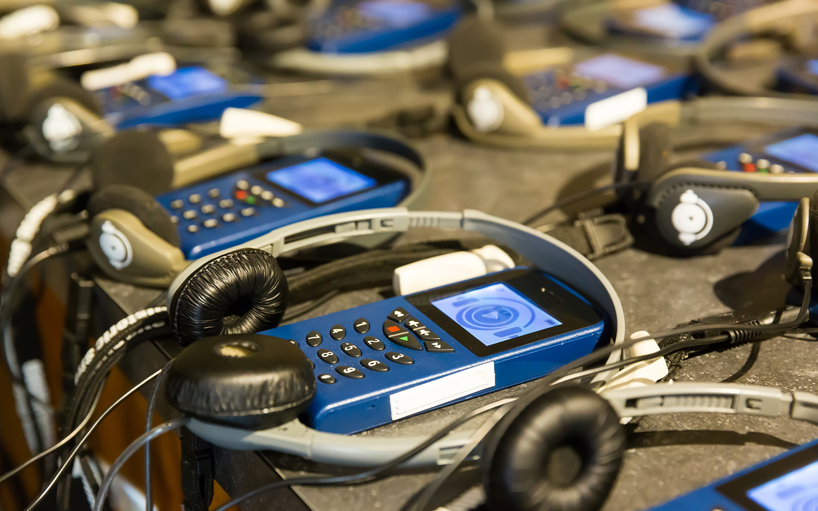 Audio guides with headphones.