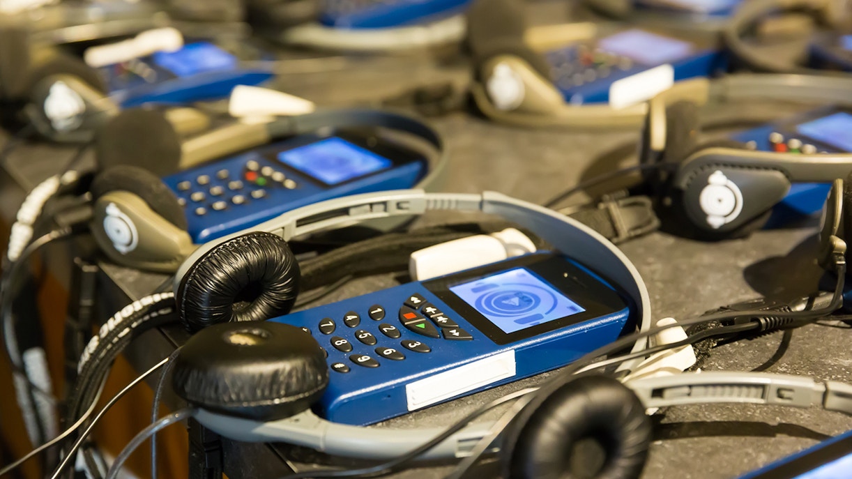 Audio guides with headphones.